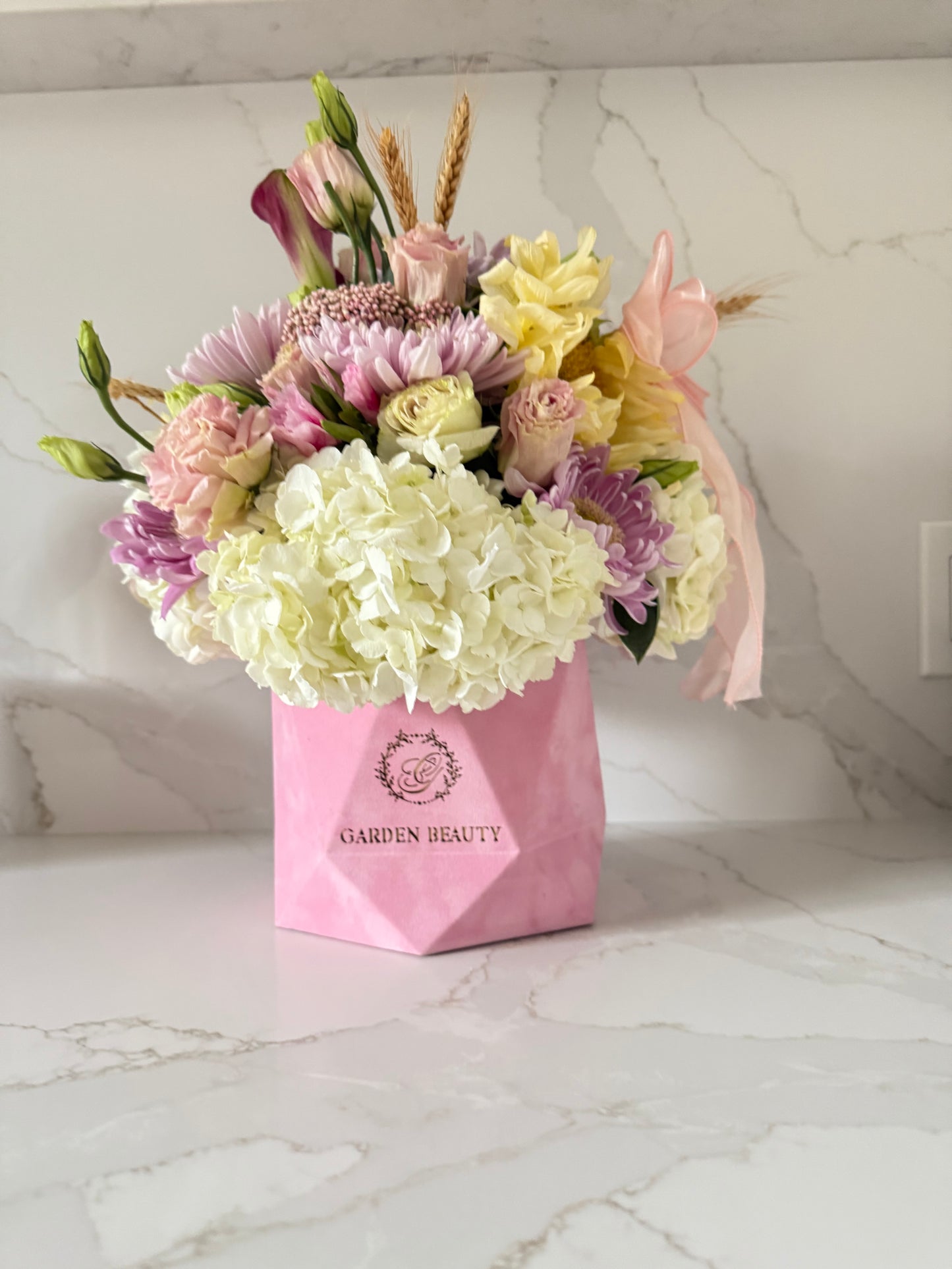 Pink soft and elegant tones of assorted flowers